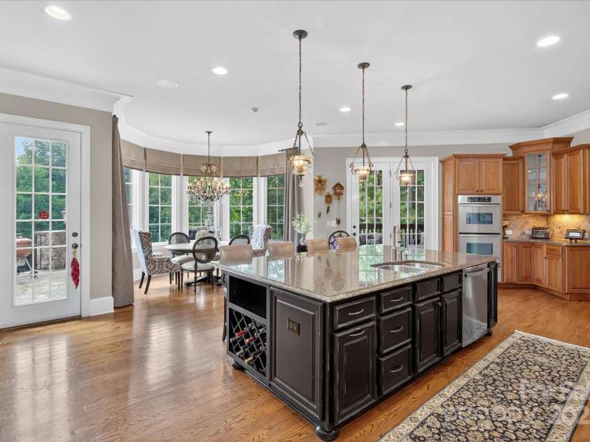 1100 Seminole Drive, Indian Land, SC 29707.  MLS# CAR4285132, YatesRealty ID 30711. Grand island with seating and storage