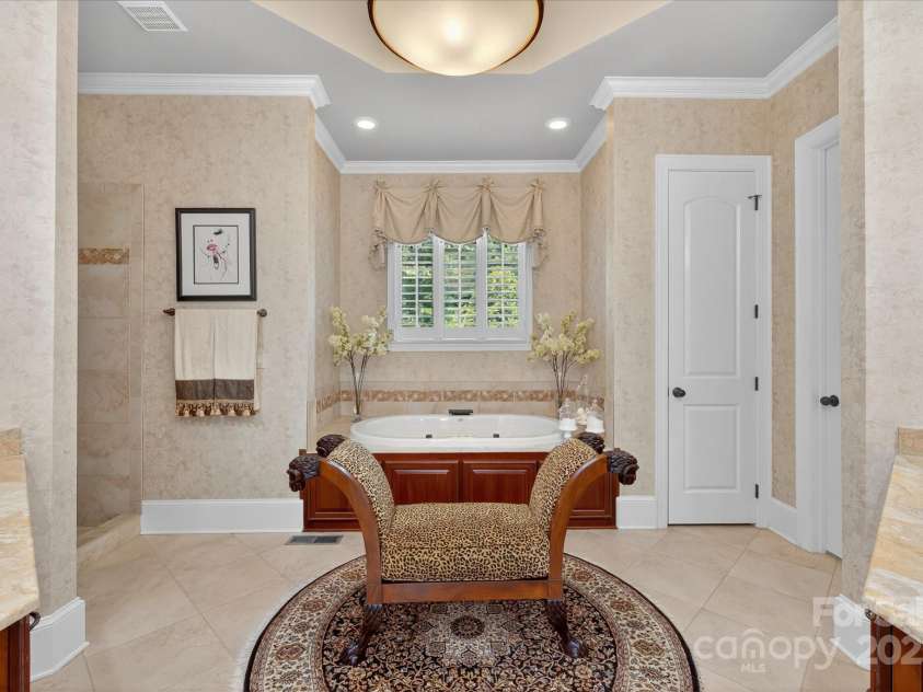 1100 Seminole Drive, Indian Land, SC 29707.  MLS# CAR4285132, YatesRealty ID 30711. Primary bath with dual vanities, grand soaking tub and spacious shower