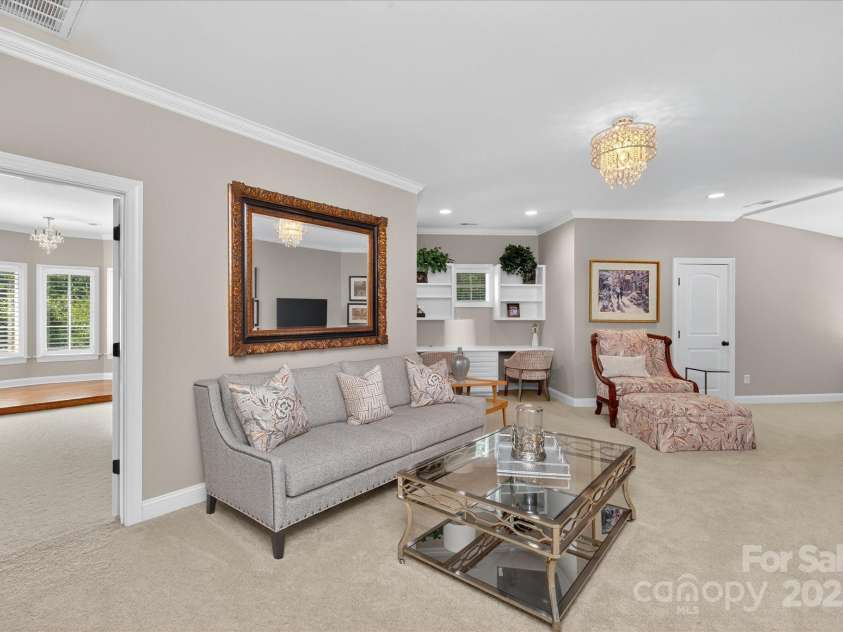 1100 Seminole Drive, Indian Land, SC 29707.  MLS# CAR4285132, YatesRealty ID 30711. Private living area on second floor connected to two en suite bedrooms