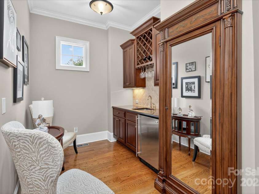 1100 Seminole Drive, Indian Land, SC 29707.  MLS# CAR4285132, YatesRealty ID 30711. Wet bar and extra storage outside the primary suite