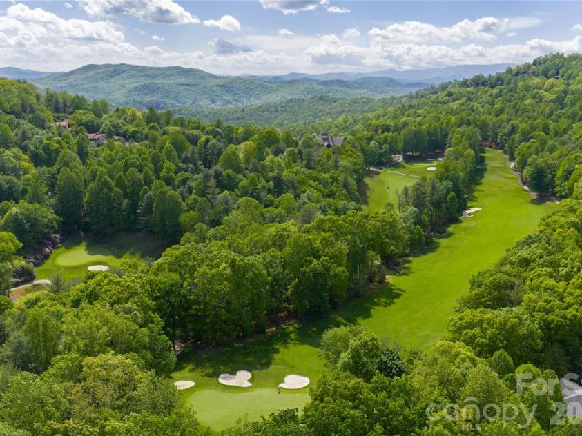99 Little Cherokee Ridge, Hendersonville, NC 28739.  MLS# CAR4375910, YatesRealty ID 30711. Champion Hills Golf Course