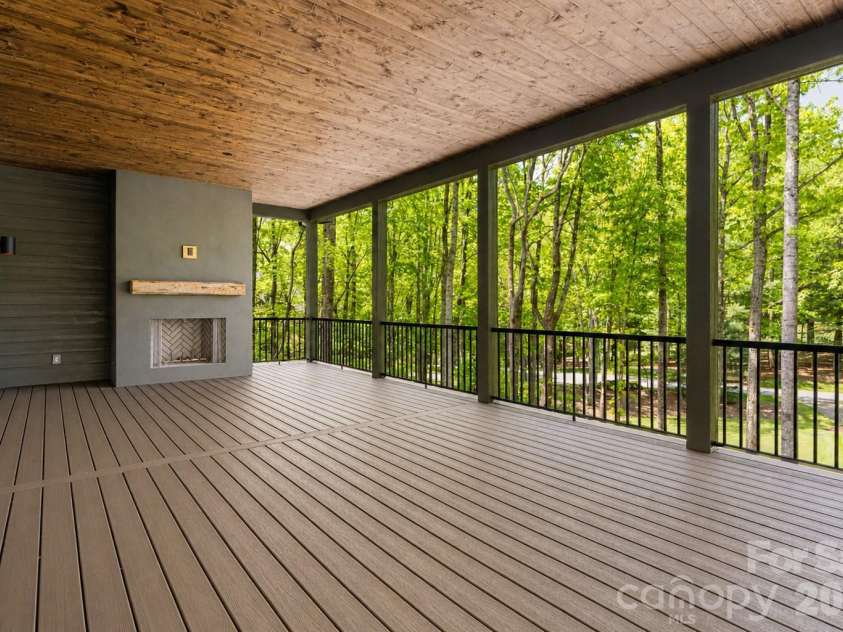 99 Little Cherokee Ridge, Hendersonville, NC 28739.  MLS# CAR4375910, YatesRealty ID 30711. Covered Back Deck