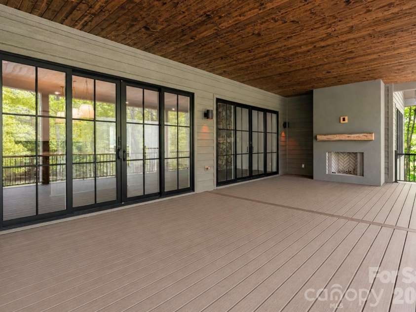 99 Little Cherokee Ridge, Hendersonville, NC 28739.  MLS# CAR4375910, YatesRealty ID 30711. Covered Back Deck