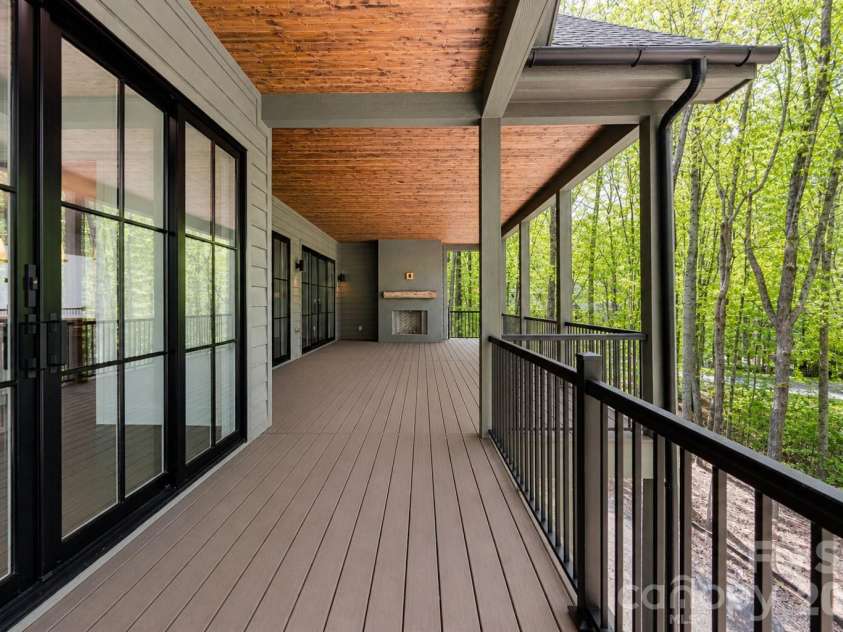 99 Little Cherokee Ridge, Hendersonville, NC 28739.  MLS# CAR4375910, YatesRealty ID 30711. Covered Back Deck