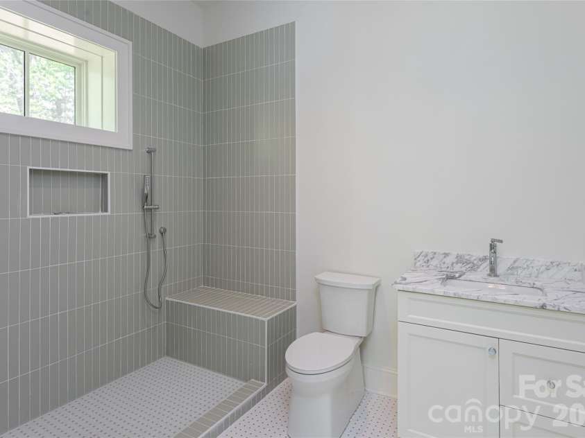 99 Little Cherokee Ridge, Hendersonville, NC 28739.  MLS# CAR4375910, YatesRealty ID 30711. Lower Level Guest Suite