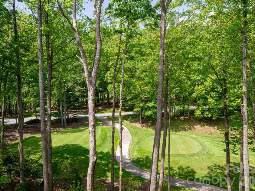 99 Little Cherokee Ridge, Hendersonville, NC 28739.  MLS# CAR4375910, YatesRealty ID 30711. Views overlooking the 7th tee