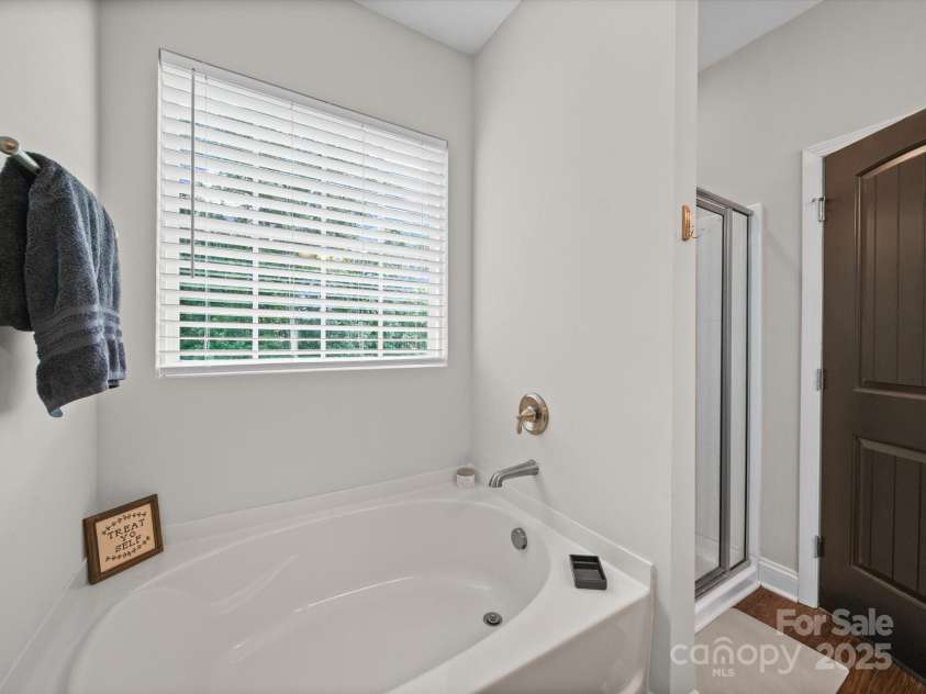 8810 Crape Myrtle Drive, Stanfield, NC 28163.  MLS# CAR4279417, YatesRealty ID 30712. Primary Bath