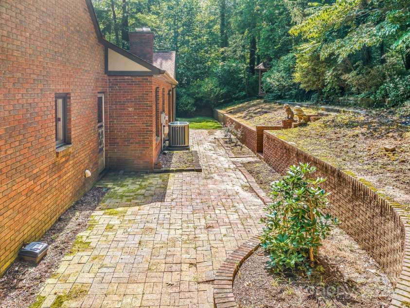 119 Yardley Court, Hendersonville, NC 28739.  MLS# CAR4285424, YatesRealty ID 30713. Back patio area