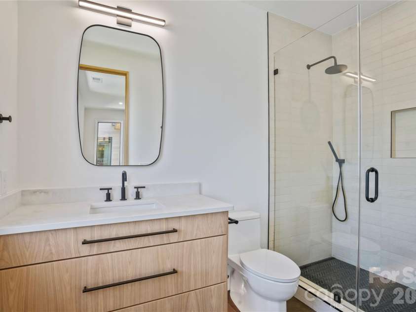 22554 John Gamble Road, Cornelius, NC 28031.  MLS# CAR4388658, YatesRealty ID 30713. Guest Bathroom 