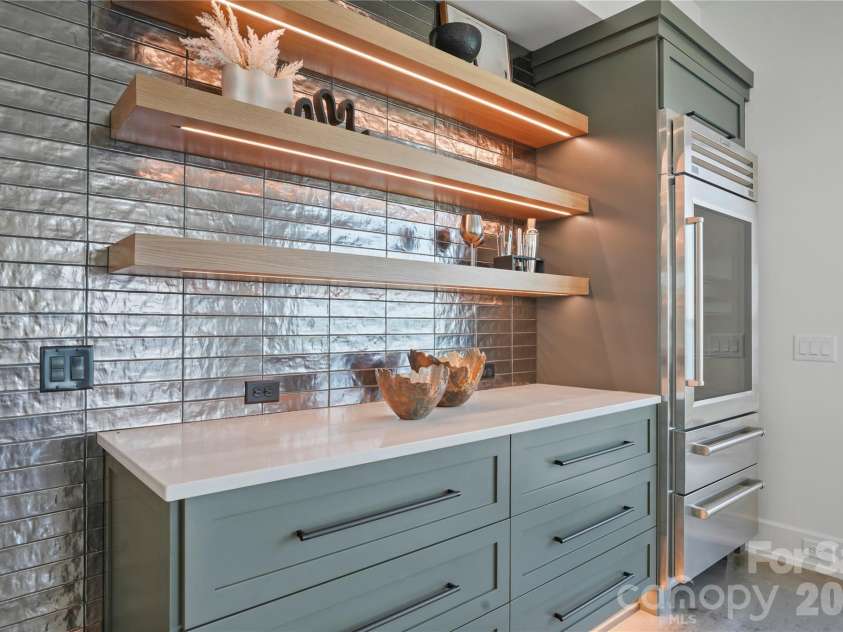 22554 John Gamble Road, Cornelius, NC 28031.  MLS# CAR4388658, YatesRealty ID 30713. Lake Room Bar/Kitchen w/ Subzero Fridge