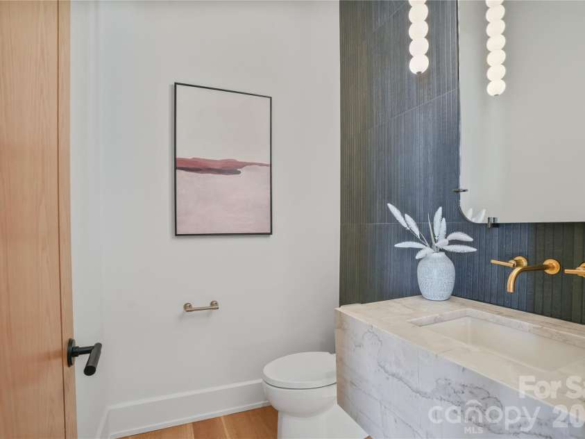 22554 John Gamble Road, Cornelius, NC 28031.  MLS# CAR4388658, YatesRealty ID 30713. Powder Room 