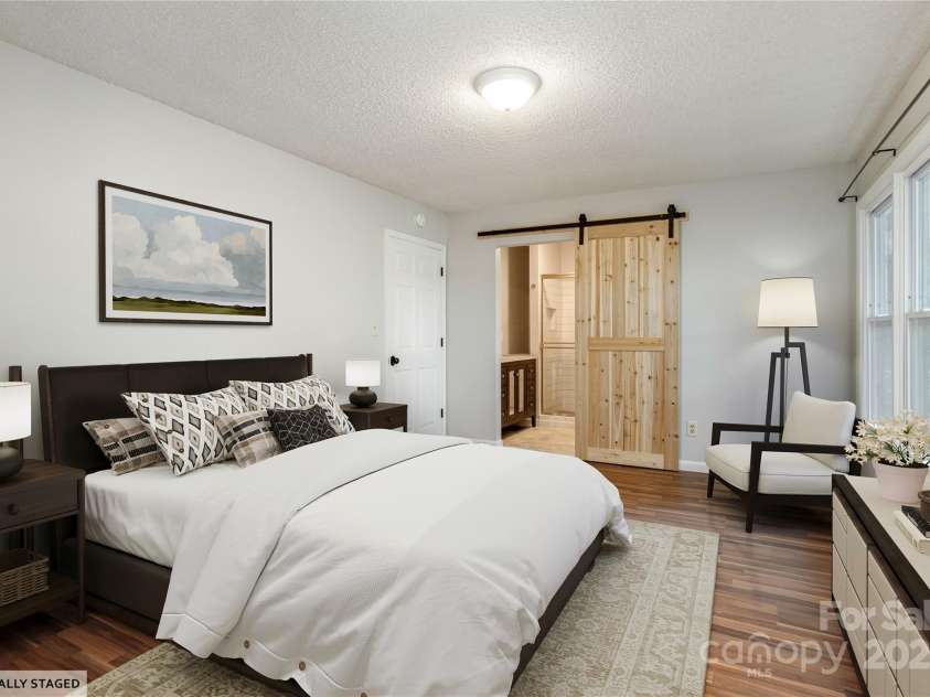 232 Stone Brook Drive, Hendersonville, NC 28791.  MLS# CAR4280883, YatesRealty ID 30718. Primary bedroom virtually staged