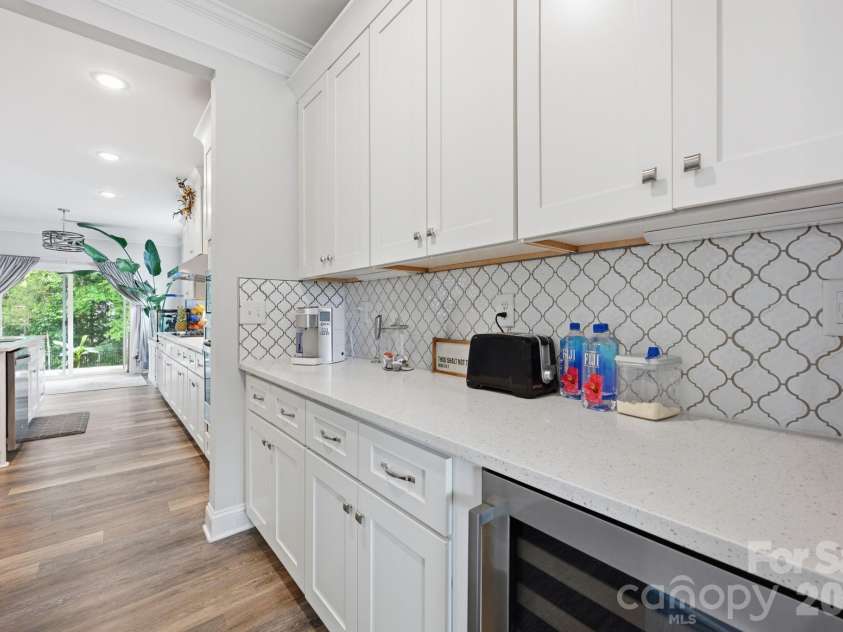 4701 Trostan Turn Turn, Kannapolis, NC 28081.  MLS# CAR4388277, YatesRealty ID 30718. Butlers pantry flows to dining