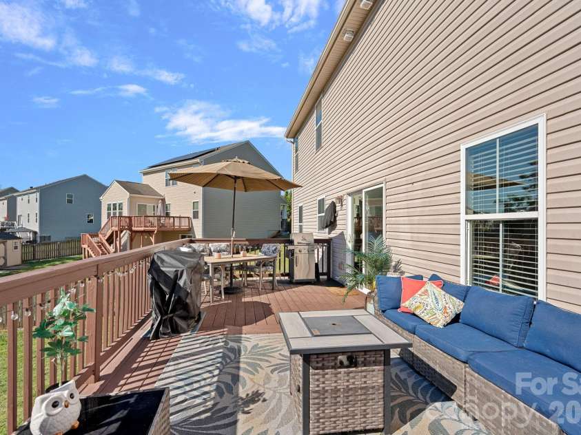 442 Almora Loop, Mooresville, NC 28115.  MLS# CAR4385982, YatesRealty ID 30720. Back deck overlooking backyard