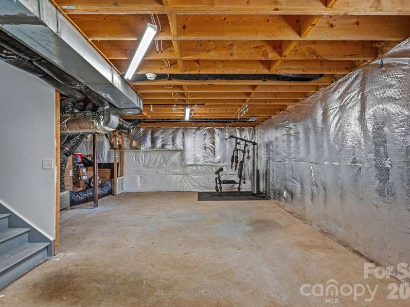 442 Almora Loop, Mooresville, NC 28115.  MLS# CAR4385982, YatesRealty ID 30720. Partially finished basement
