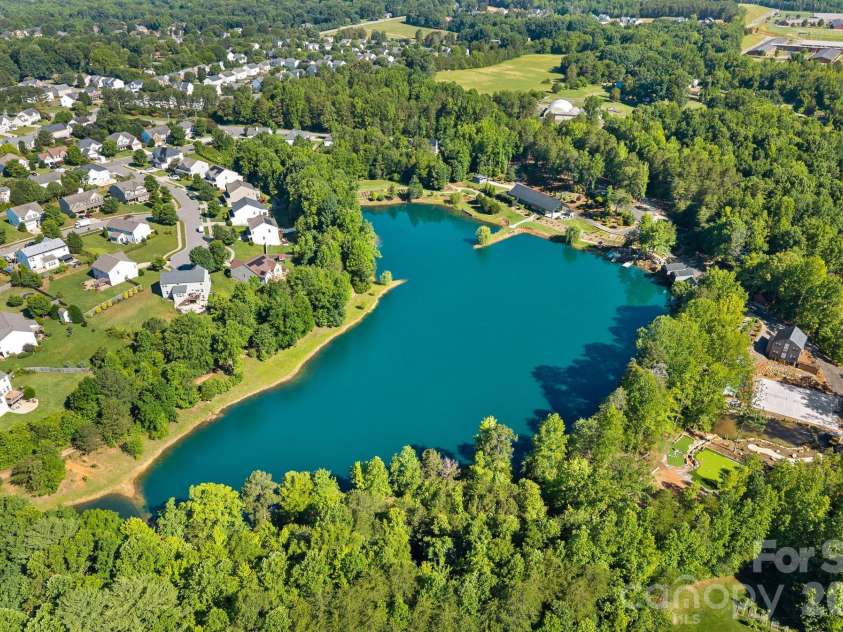 442 Almora Loop, Mooresville, NC 28115.  MLS# CAR4385982, YatesRealty ID 30720. Walking trails around community pond