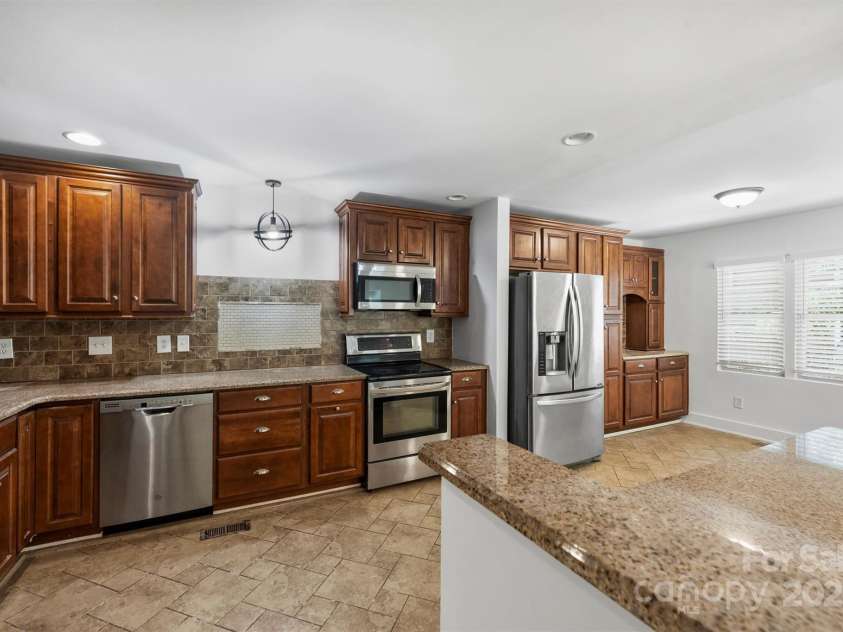 3408 Winterfield Place, Charlotte, NC 28205.  MLS# CAR4284474, YatesRealty ID 30724. Kitchen - Tons of cabinets and counterspace!