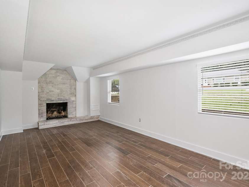 3408 Winterfield Place, Charlotte, NC 28205.  MLS# CAR4284474, YatesRealty ID 30724. Primary Bedroom with fireplace