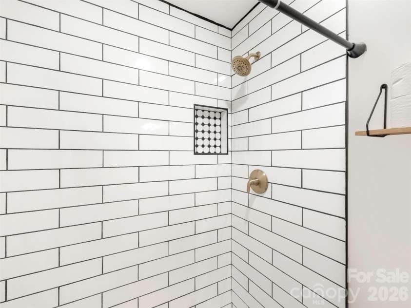 3814 Wonderland Drive, Matthews, NC 28104.  MLS# CAR4391845, YatesRealty ID 30724. Custom tile shower