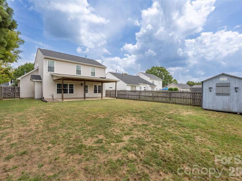 9535 Forest Path Drive, Charlotte, NC 28269.  MLS# CAR4388115, YatesRealty ID 30726. Back of home