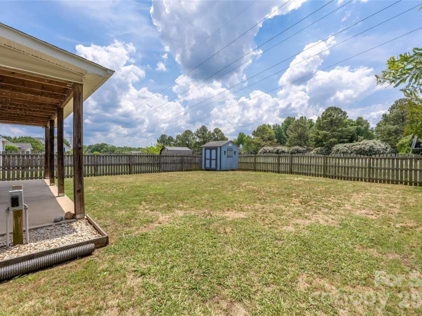 9535 Forest Path Drive, Charlotte, NC 28269.  MLS# CAR4388115, YatesRealty ID 30726. Back yard
