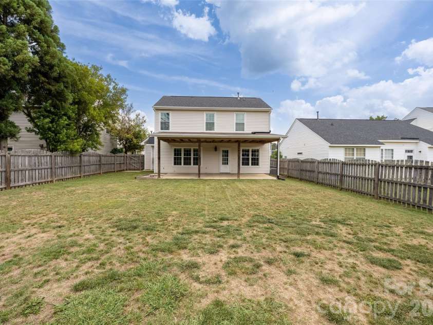 9535 Forest Path Drive, Charlotte, NC 28269.  MLS# CAR4388115, YatesRealty ID 30726. Rear exterior