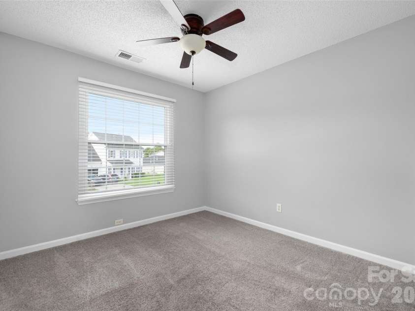 9535 Forest Path Drive, Charlotte, NC 28269.  MLS# CAR4388115, YatesRealty ID 30726. Secondary bedroom 1