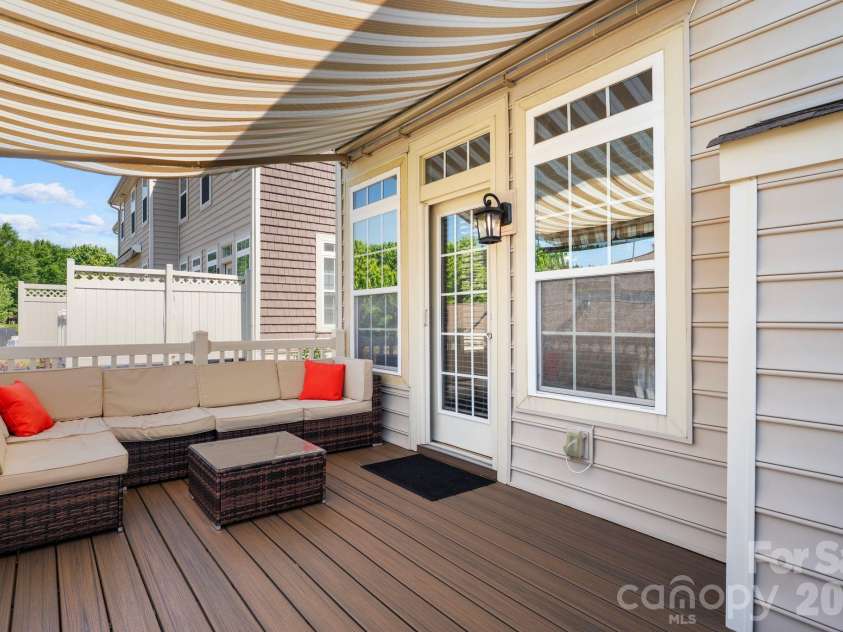 18533 The Commons Boulevard, Cornelius, NC 28031.  MLS# CAR4374906, YatesRealty ID 30727. Back Porch with Composite Decking
