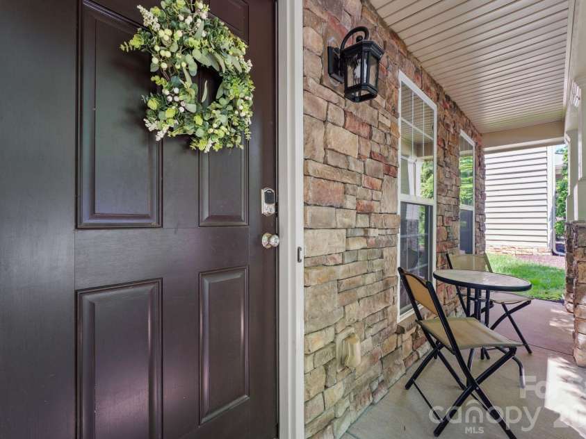 18533 The Commons Boulevard, Cornelius, NC 28031.  MLS# CAR4374906, YatesRealty ID 30727. Covered Front Porch
