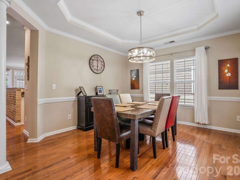 18533 The Commons Boulevard, Cornelius, NC 28031.  MLS# CAR4374906, YatesRealty ID 30727. Formal Dining