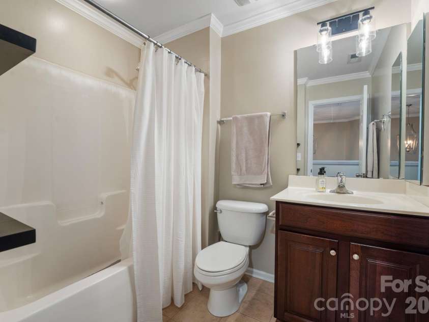 18533 The Commons Boulevard, Cornelius, NC 28031.  MLS# CAR4374906, YatesRealty ID 30727. Full Hall Bathroom