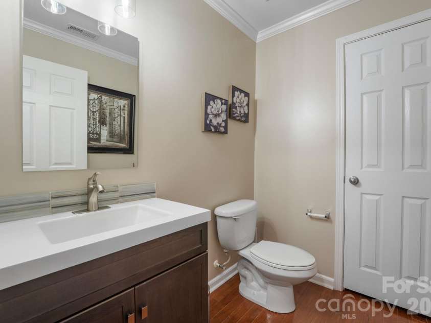 18533 The Commons Boulevard, Cornelius, NC 28031.  MLS# CAR4374906, YatesRealty ID 30727. Lower Level Half Bathroom