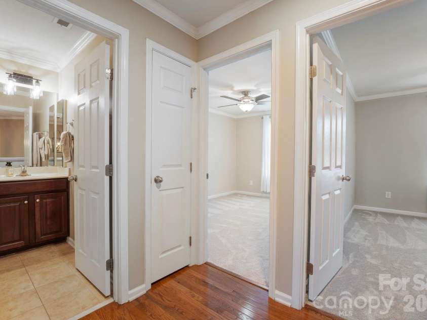 18533 The Commons Boulevard, Cornelius, NC 28031.  MLS# CAR4374906, YatesRealty ID 30727. Upper Level Hall: Bedrooms 2 & 3