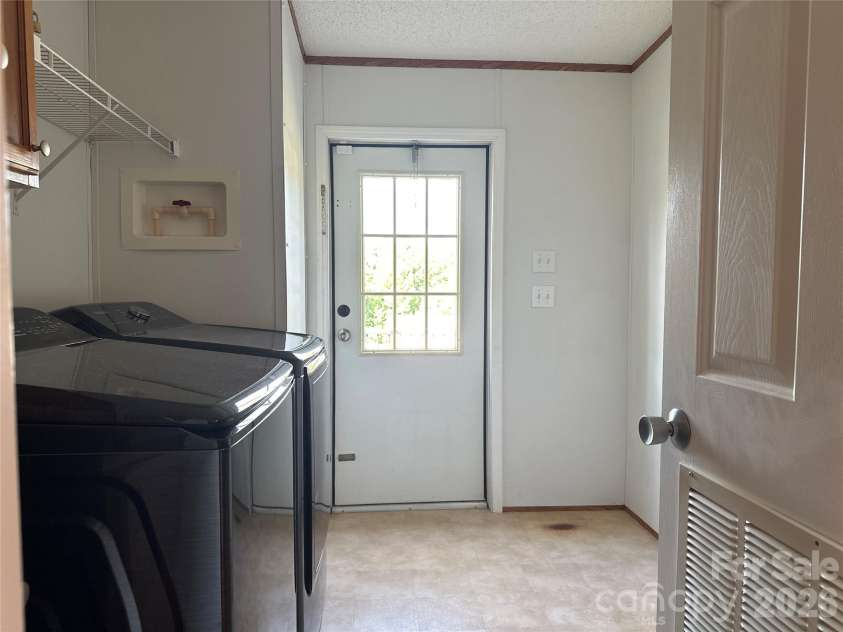 2567 Peeler Road, Vale, NC 28168.  MLS# CAR4389141, YatesRealty ID 30730. Laundry Room
