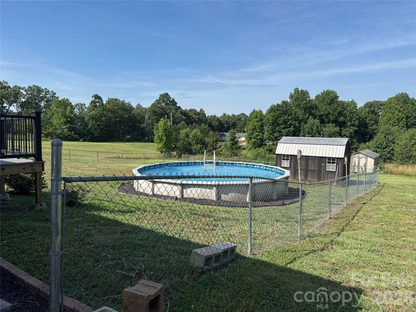 2567 Peeler Road, Vale, NC 28168.  MLS# CAR4389141, YatesRealty ID 30730. Pool with fenced yard