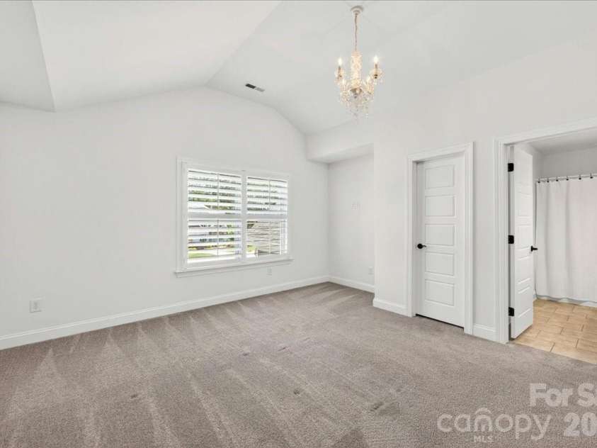 104 Broad Birch Drive, Davidson, NC 28036.  MLS# CAR4388325, YatesRealty ID 30731. Bedroom 2 with full bath