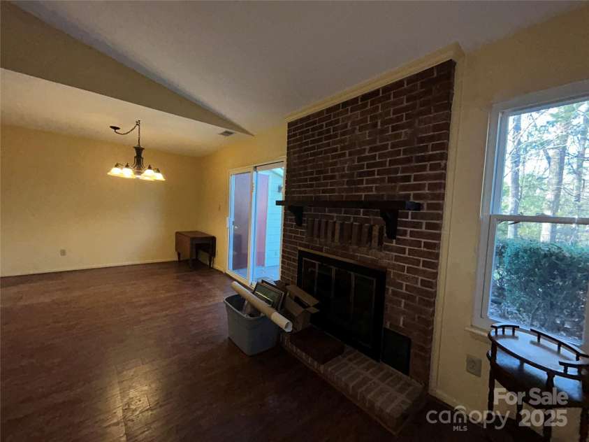 1034 Sardis Cove Drive, Charlotte, NC 28270.  MLS# CAR4288029, YatesRealty ID 30735. View of living room looking towards dining room.