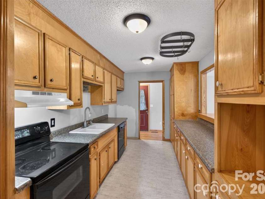 66 Misery Ridge Trail, Mill Spring, NC 28756.  MLS# CAR4385906, YatesRealty ID 30739. I'm told propane gas is readily available. Buyer to verify if important.