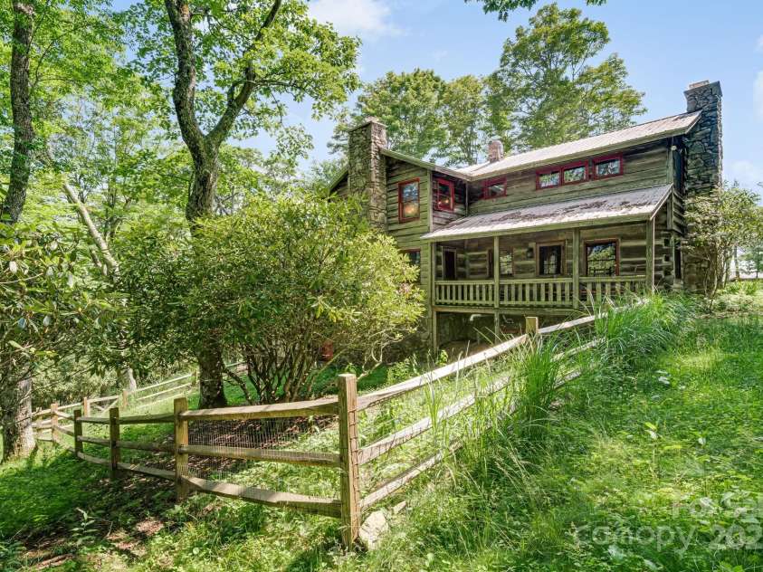 50 Mountain Top Lane, Mars Hill, NC 28754.  MLS# CAR4276175, YatesRealty ID 30742. Fenced in yard for your four legged friends.