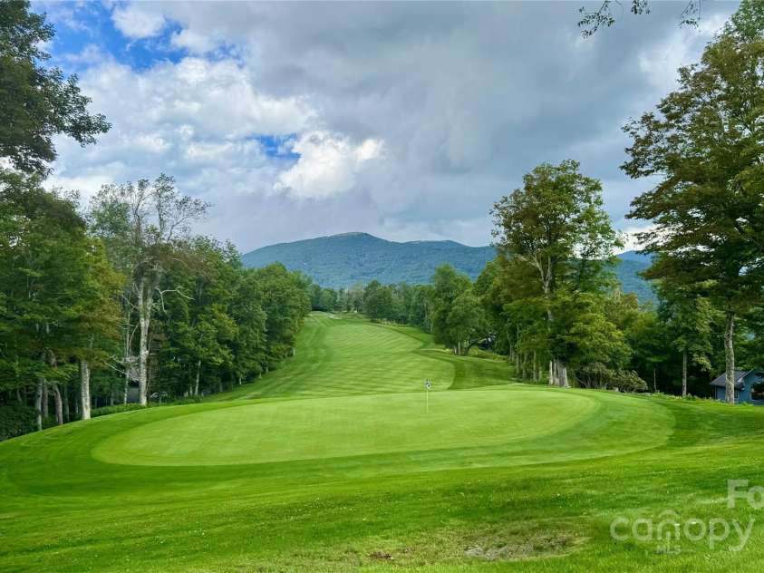 50 Mountain Top Lane, Mars Hill, NC 28754.  MLS# CAR4276175, YatesRealty ID 30742. Hole #3 of the 5 Star Wolf Laurel Country Club 18 Hole Golf Course.