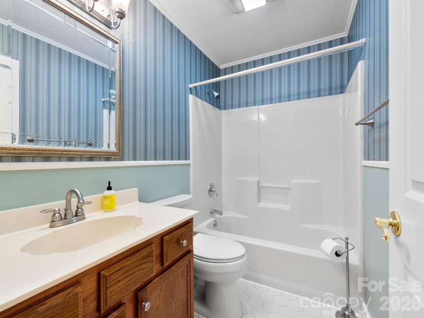 11 Robin Lane, Weaverville, NC 28787.  MLS# CAR4392260, YatesRealty ID 30744. BA 2 - between BR 2 and 3