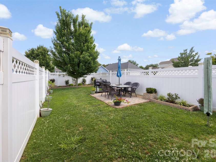 126 Kingston Drive, Locust, NC 28097.  MLS# CAR4393896, YatesRealty ID 30746. Fenced Back Yard