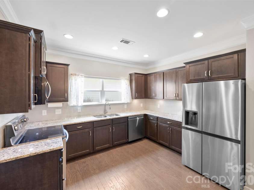 126 Kingston Drive, Locust, NC 28097.  MLS# CAR4393896, YatesRealty ID 30746. Kitchen