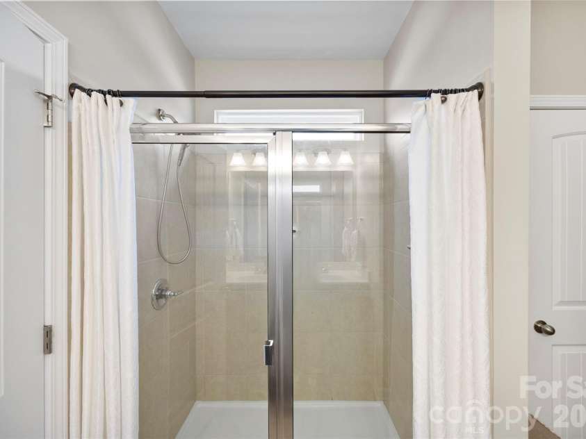 126 Kingston Drive, Locust, NC 28097.  MLS# CAR4393896, YatesRealty ID 30746. Primary Shower