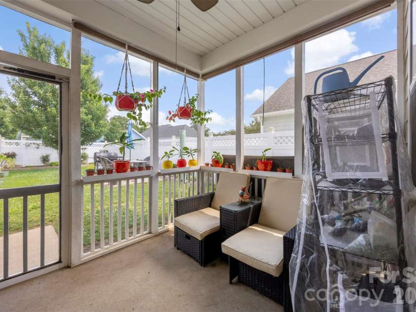 126 Kingston Drive, Locust, NC 28097.  MLS# CAR4393896, YatesRealty ID 30746. Screened Rear Porch