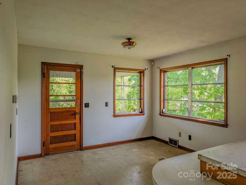 56 Gill Branch Road, Weaverville, NC 28787.  MLS# CAR4270678, YatesRealty ID 3075. 1960's home with solid bones could use some attention.