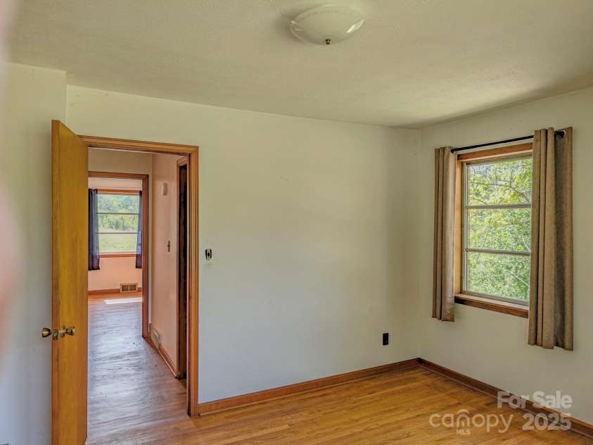 56 Gill Branch Road, Weaverville, NC 28787.  MLS# CAR4270678, YatesRealty ID 3075. Decent size bedrooms for the 60's.