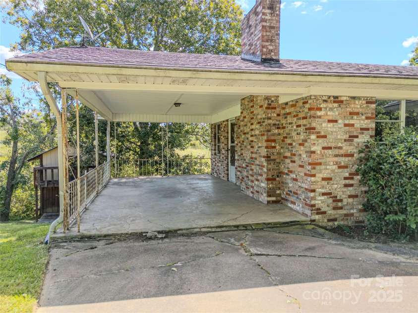 56 Gill Branch Road, Weaverville, NC 28787.  MLS# CAR4270678, YatesRealty ID 3075. Mid-century style built in the 60's.