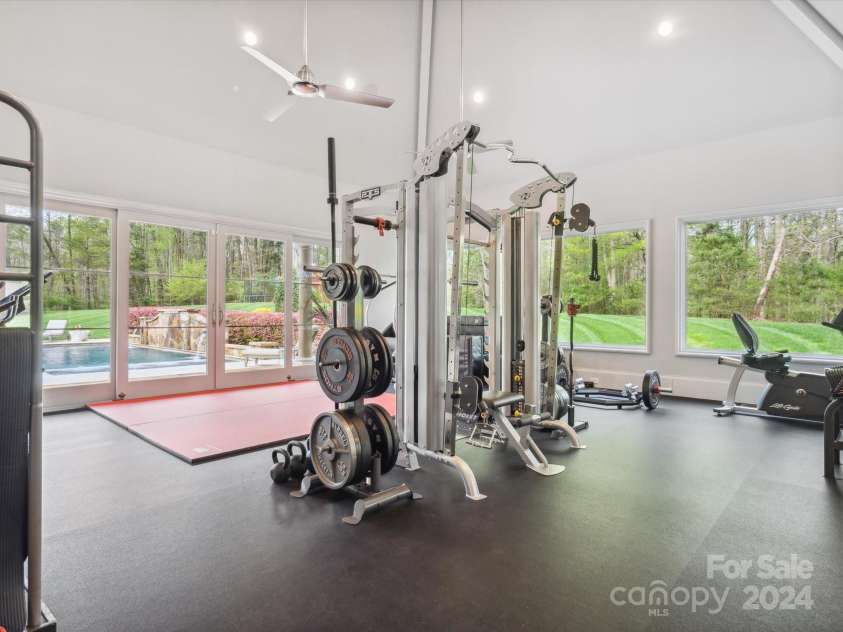 9044 Island Point Road, Charlotte, NC 28278.  MLS# CAR4135509, YatesRealty ID 3075. Full Gym with 15 foot cathedral ceilings