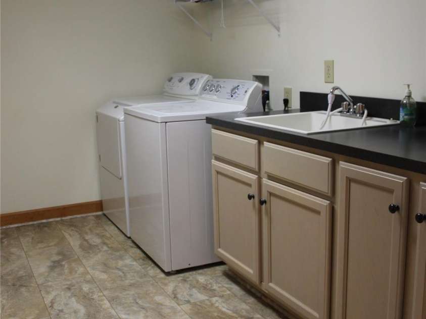 372 Silver Springs Drive, Banner Elk, NC 28604.  MLS# CAR4275590, YatesRealty ID 30750. Basement Laundry Room